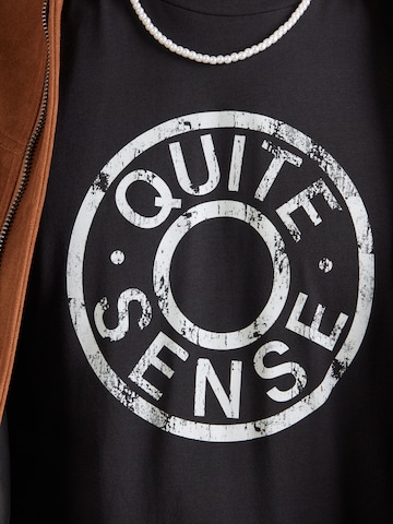 QS - Camisa em preto