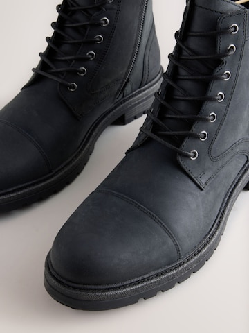 Boots stringati di Next in nero