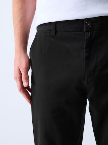 Next Slimfit Lærredsbukser i sort
