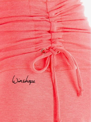 Winshape Zúžený strih Športové nohavice 'WH1' - oranžová