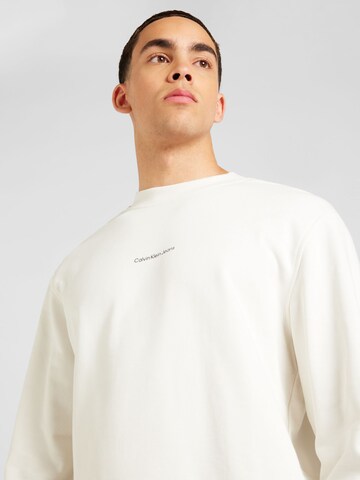 Sweat-shirt 'CITY GRID MAP' Calvin Klein Jeans en blanc