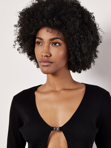 Cardigan Apricot en noir
