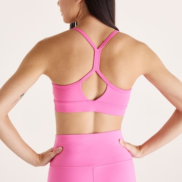 new balance - Bustier Sujetador deportivo 'Essential' en rosa