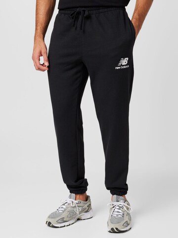 Tapered Pantaloni 'Essentials' de la new balance pe negru: față