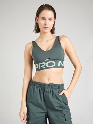 NIKE Bustier Sports-BH 'INDY' i grøn: forside