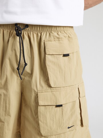 Nike Sportswear Loose fit Cargo trousers in Beige
