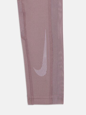 NIKE Slim fit Sports trousers in Grey