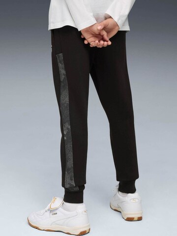 regular Pantaloni sportivi 'Puma Ess Camo Sweatpants' di PUMA in nero