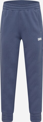 Effilé Pantalon de sport NIKE en bleu : devant