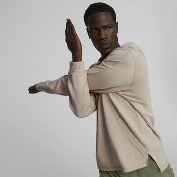 PUMA Sports sweatshirt in Beige