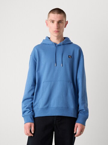 Sweat-shirt Calvin Klein Jeans en bleu : devant