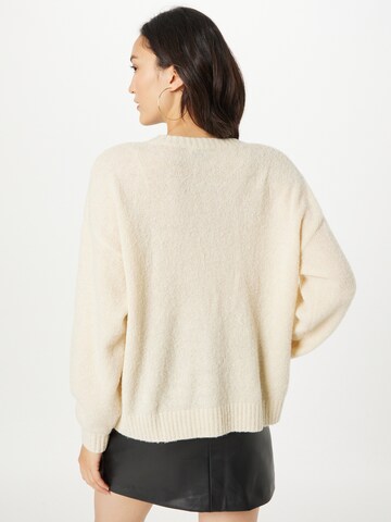 Pull-over modström en beige