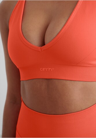 Bustino Reggiseno sportivo di Aim'n in arancione