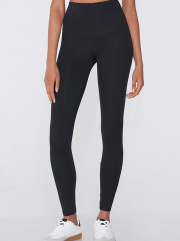 Tezenis Skinny Leggings in Black: front