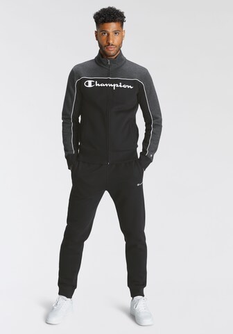 Champion Authentic Athletic Apparel Tracksuit in Black: front