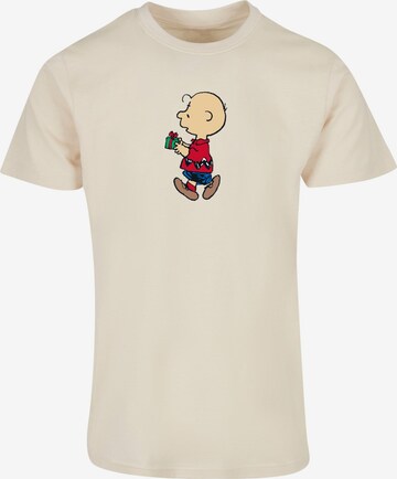 Merchcode Shirt 'Peanuts Charlies Small Surprise' in Beige: voorkant