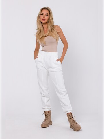 made of emotion - Tapered Pantalón en beige