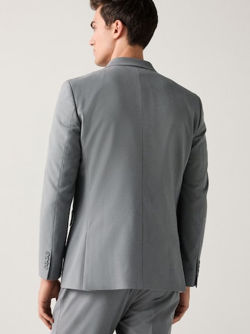 Next Slim fit Business-colbert 'Motionflex' in Grijs