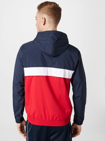 Champion Authentic Athletic Apparel Tussenjas in Rood