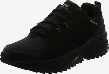 Baskets basses SKECHERS en noir : devant