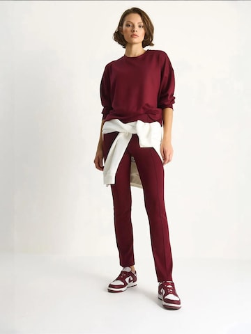 Tuta da jogging di Bianco Lucci in rosso