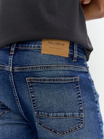 Pull&Bear Слим фит Дънки в синьо