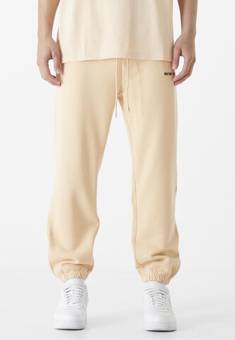 Loosefit Pantalon 'Essential' 9N1M SENSE en beige : devant
