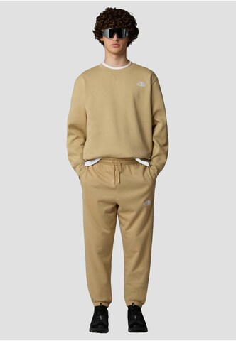 Tapered Pantaloni di THE NORTH FACE in beige