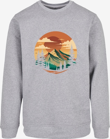 Pull-over 'Sonnenuntergang Berglandschaft' F4NT4STIC en gris : devant