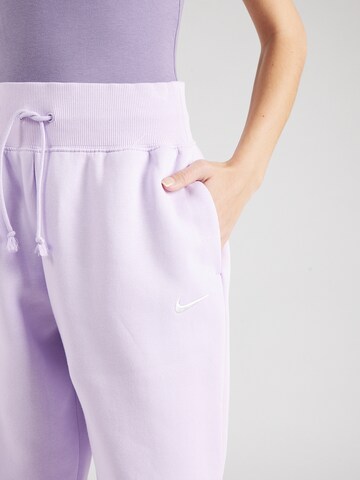 Nike Sportswear - Tapered Calças 'Phoenix Fleece' em roxo