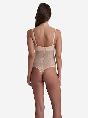 Body modelant 'Lacy Open Bust Bodysuit' Bye Bra en beige