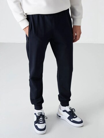 Tapered Pantaloni di Tommy Life in blu