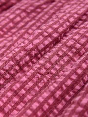 Salopeta de la Next pe roșu