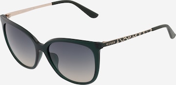 Lunettes de soleil GUESS en vert : devant