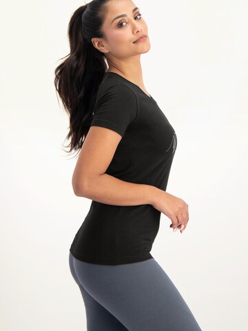 Urban Goddess Yoga & Activewear Sporttop 'Namaste Core Yoga and Pilates' in Schwarz