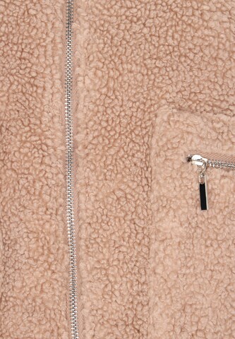 swirly Tussenjas in Beige