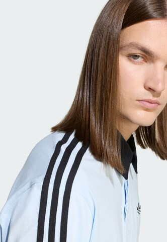 Maglietta di ADIDAS ORIGINALS in blu