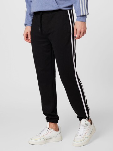 Trendyol Tapered Pants in Black: front