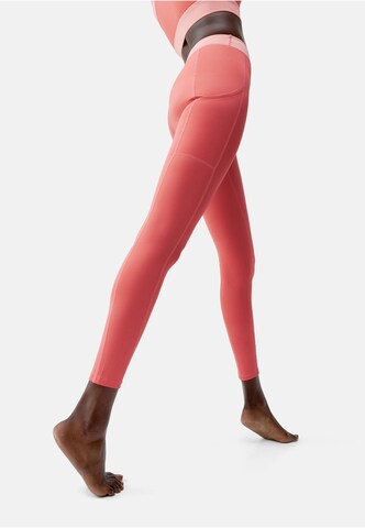 Born Living Yoga Skinny Sportbroek 'Xenia' in Oranje