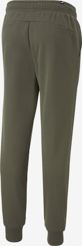 Effilé Pantalon de sport PUMA en vert