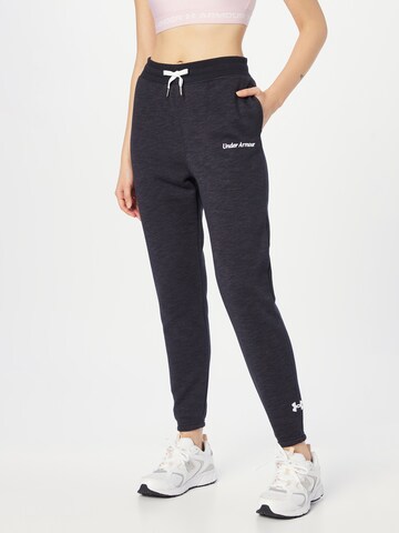 Effilé Pantalon de sport UNDER ARMOUR en noir : devant