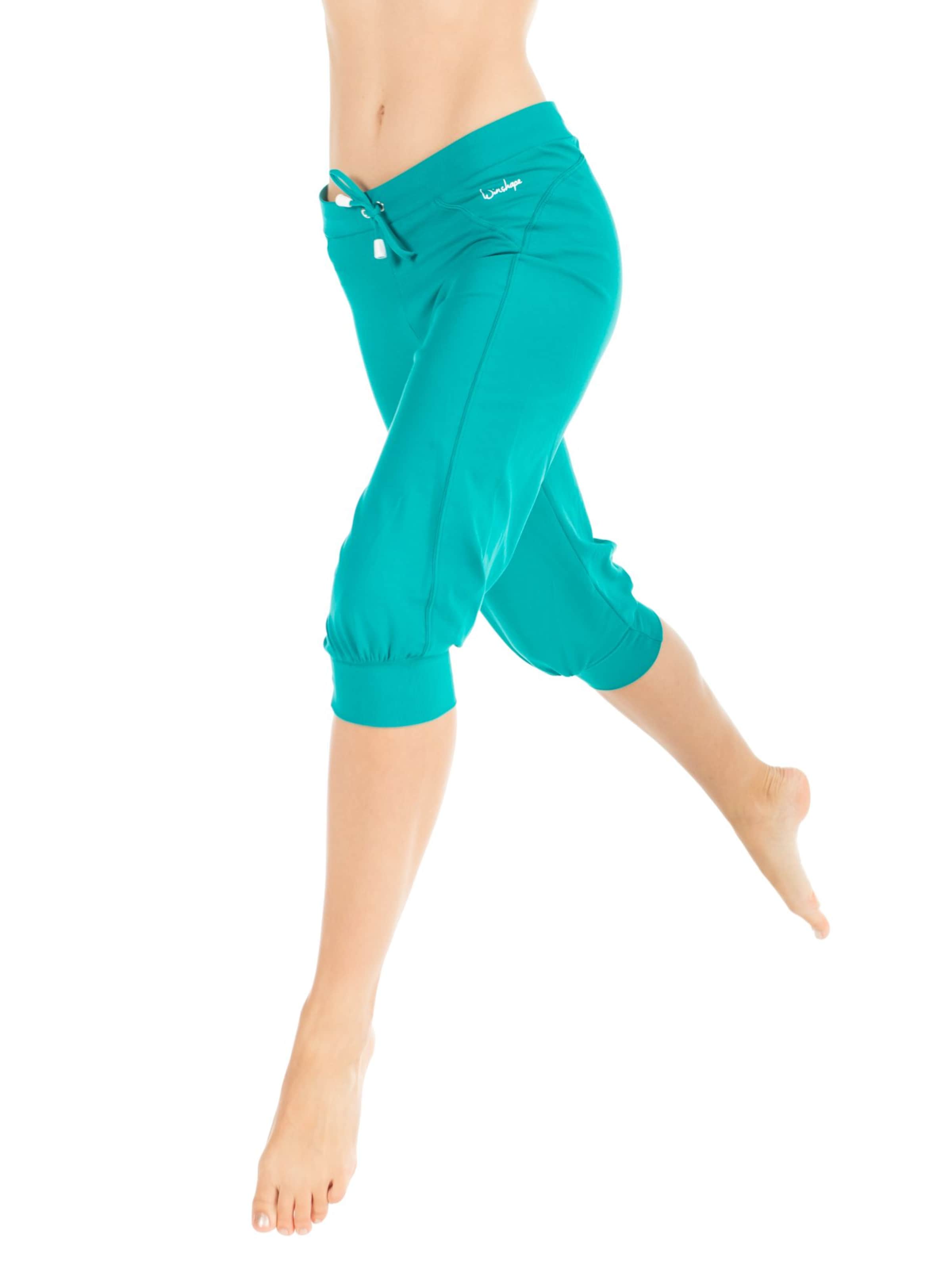 Winshape Tapered Sporthose 'WBE5' in Grün