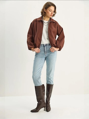 Bianco Lucci Tussenjas in Bruin