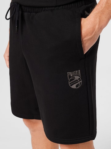 juoda PUMA Standartinis Sportinės kelnės 'Booster'