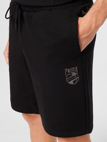 PUMA Regular Sportshorts 'Booster' in Schwarz