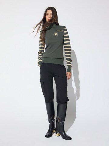 Pullover di Lola Casademunt in verde: frontale
