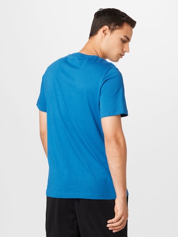 PUMA Koszulka funkcyjna 'Essentials' w kolorze niebieski