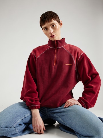 Pull-over iets frans en rouge