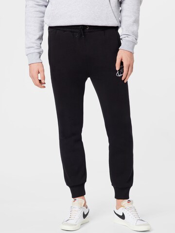 FUBU Tapered Pants in Black: front