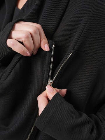 Veste de survêtement Metamorphoza en noir